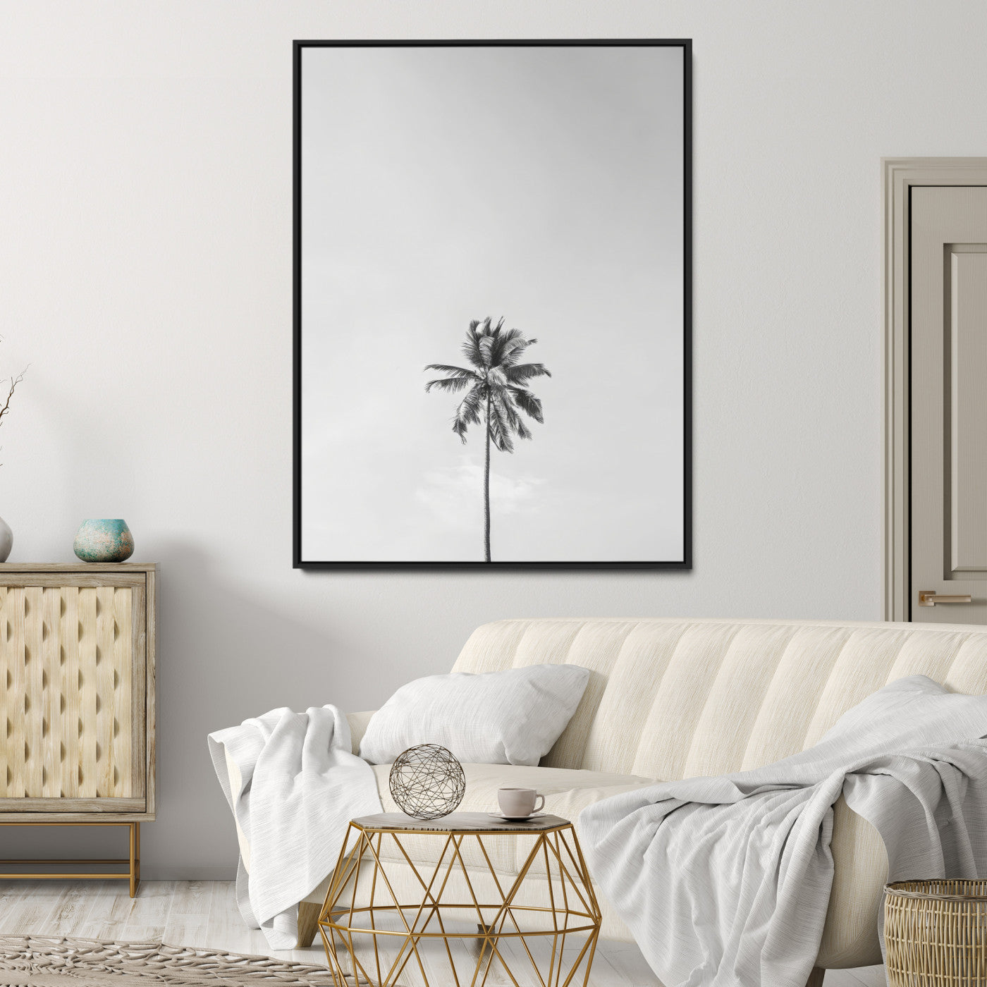 Canvas of a single palm tree in black and white with minimalist sky, ideal for modern coastal minimalist or tropical-inspired home decor.