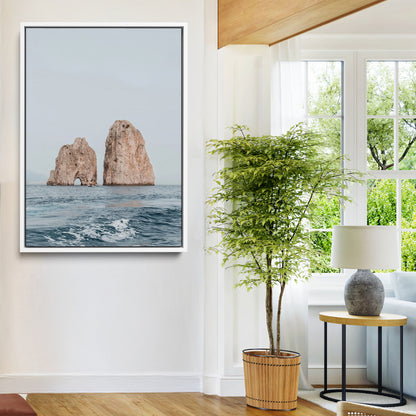 Serene photograph of the Faraglioni rocks in Capri with calm blue waters, perfect for Mediterranean coastal or minimalist travel-themed decor.