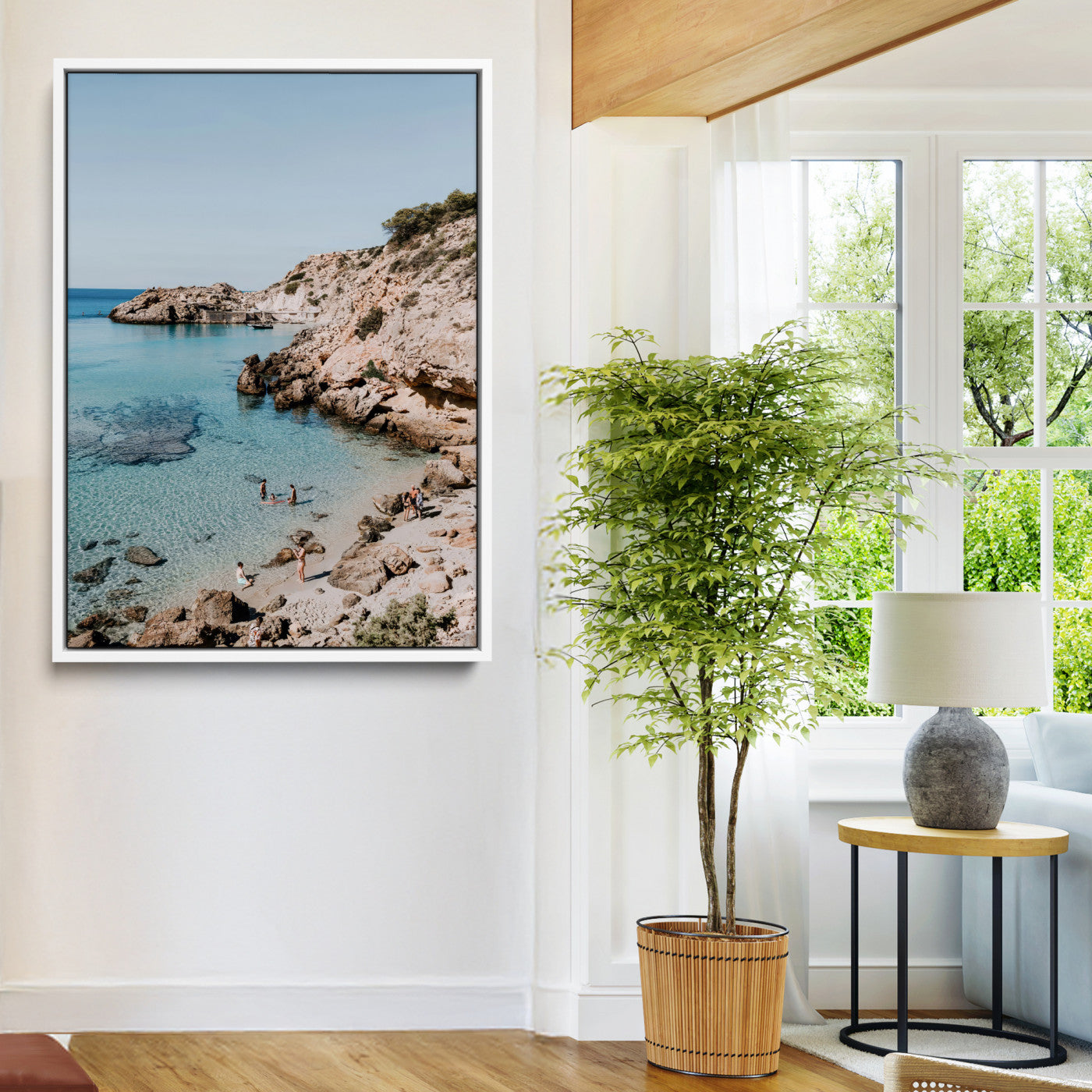 A vibrant coastal photo of a rocky Mediterranean cove with turquoise waters and beachgoers, ideal for boho coastal or summer-inspired interiors.