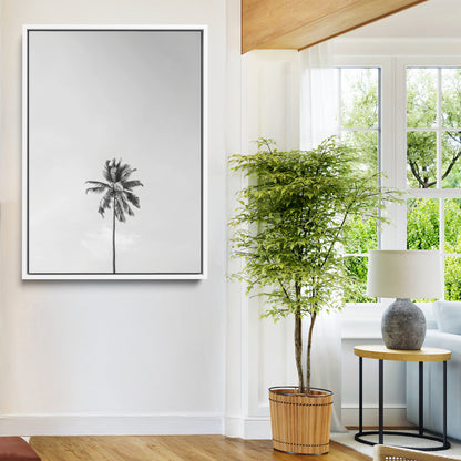 Canvas of a single palm tree in black and white with minimalist sky, ideal for modern coastal minimalist or tropical-inspired home decor.