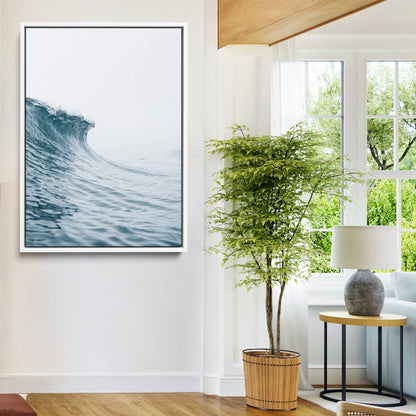 A single ocean wave curling in soft blue tones under a misty sky, ideal for coastal or minimalist home wall decor.