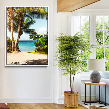 Tropical beach with palm trees, blue ocean, and clear sky, perfect for coastal or beach-themed wall decor in sunny living spaces.