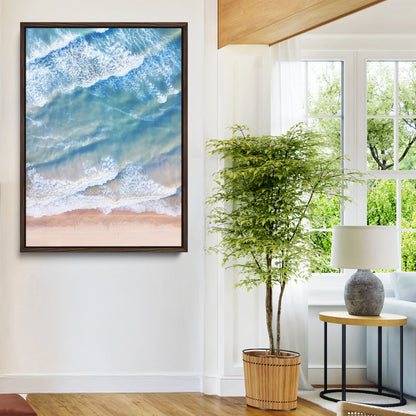 Aerial photo of soft blue waves meeting sandy shore, perfect for modern coastal or beach-themed decor with a light and tranquil aesthetic.