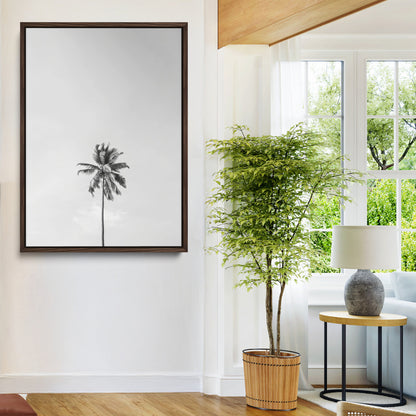 Canvas of a single palm tree in black and white with minimalist sky, ideal for modern coastal minimalist or tropical-inspired home decor.