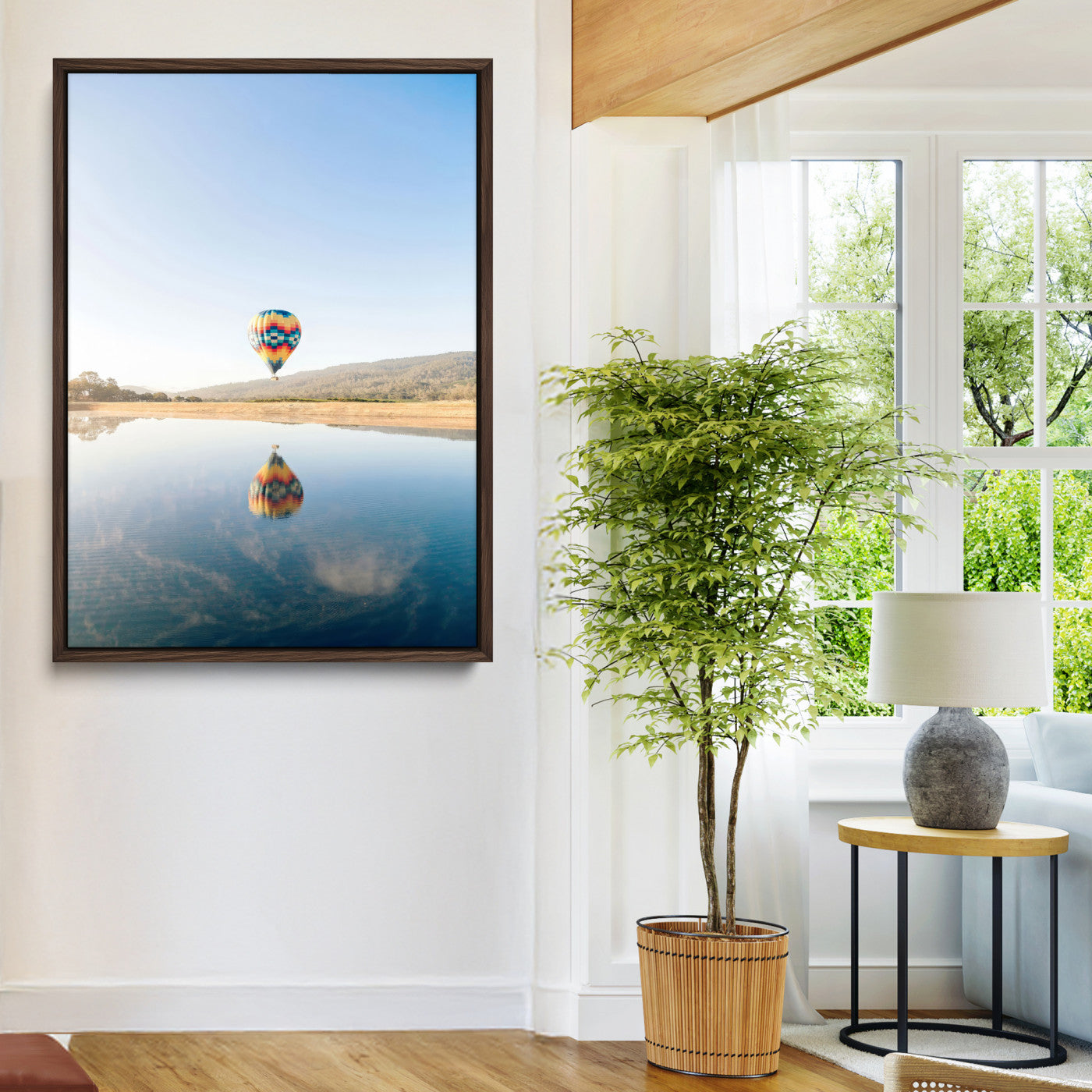Canvas of a hot air balloon floating above a calm lake with soft reflections and vibrant sky, ideal for modern minimalist or adventure-themed home decor.