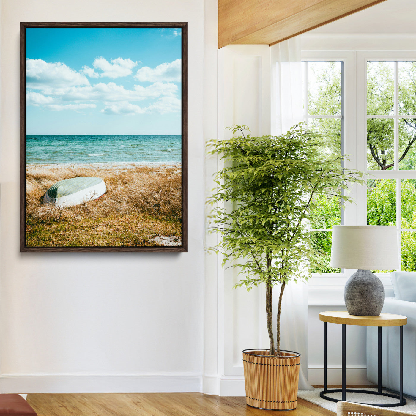 A small boat resting on a grassy shore with ocean waves and a bright blue sky, creating a peaceful coastal atmosphere.