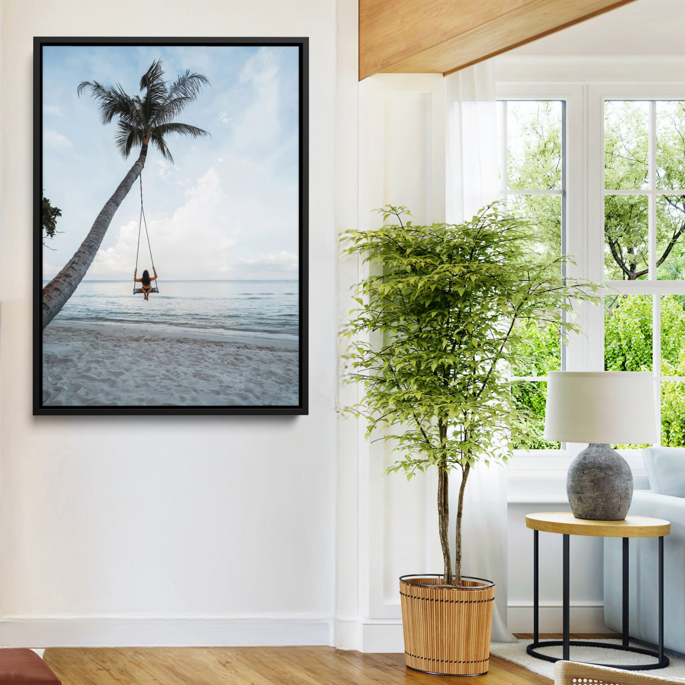 Wall art of a girl on a swing hanging from a palm tree over calm ocean waters, perfect for tropical or minimalist coastal decor.
