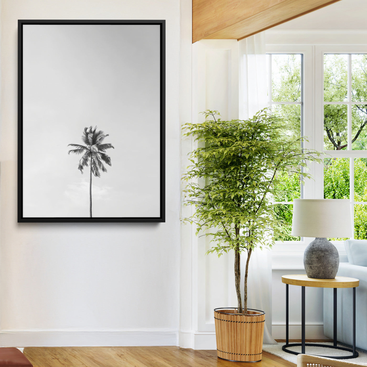 Canvas of a single palm tree in black and white with minimalist sky, ideal for modern coastal minimalist or tropical-inspired home decor.