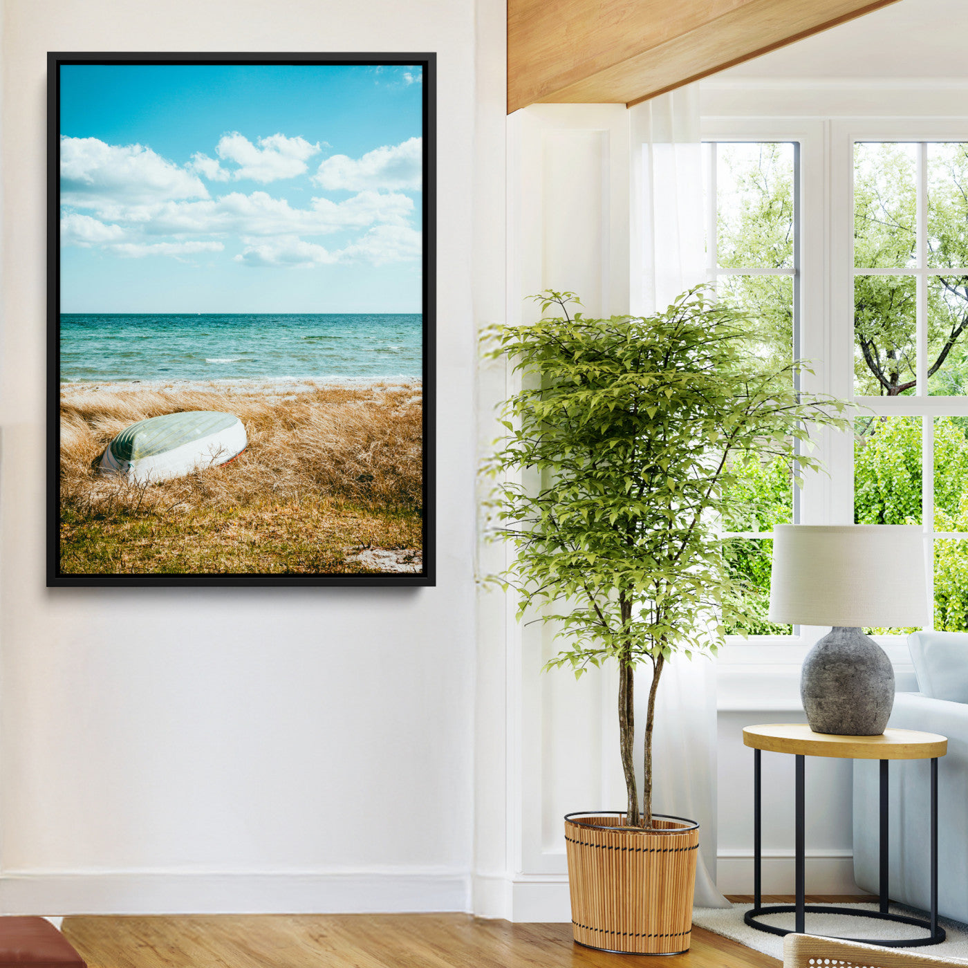A small boat resting on a grassy shore with ocean waves and a bright blue sky, creating a peaceful coastal atmosphere.