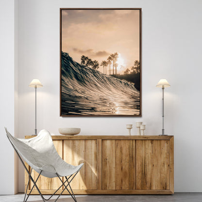 Golden sunset view of an ocean wave curling near palm trees, radiating warm tones perfect for coastal or tropical-themed decor.