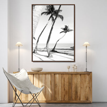 Black and white wall art of palm trees and a hammock on a beach, ideal for coastal minimalist or tropical-themed decor.