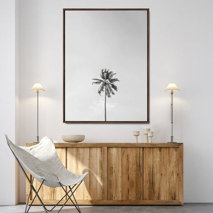 Canvas of a single palm tree in black and white with minimalist sky, ideal for modern coastal minimalist or tropical-inspired home decor.