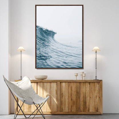 A single ocean wave curling in soft blue tones under a misty sky, ideal for coastal or minimalist home wall decor.