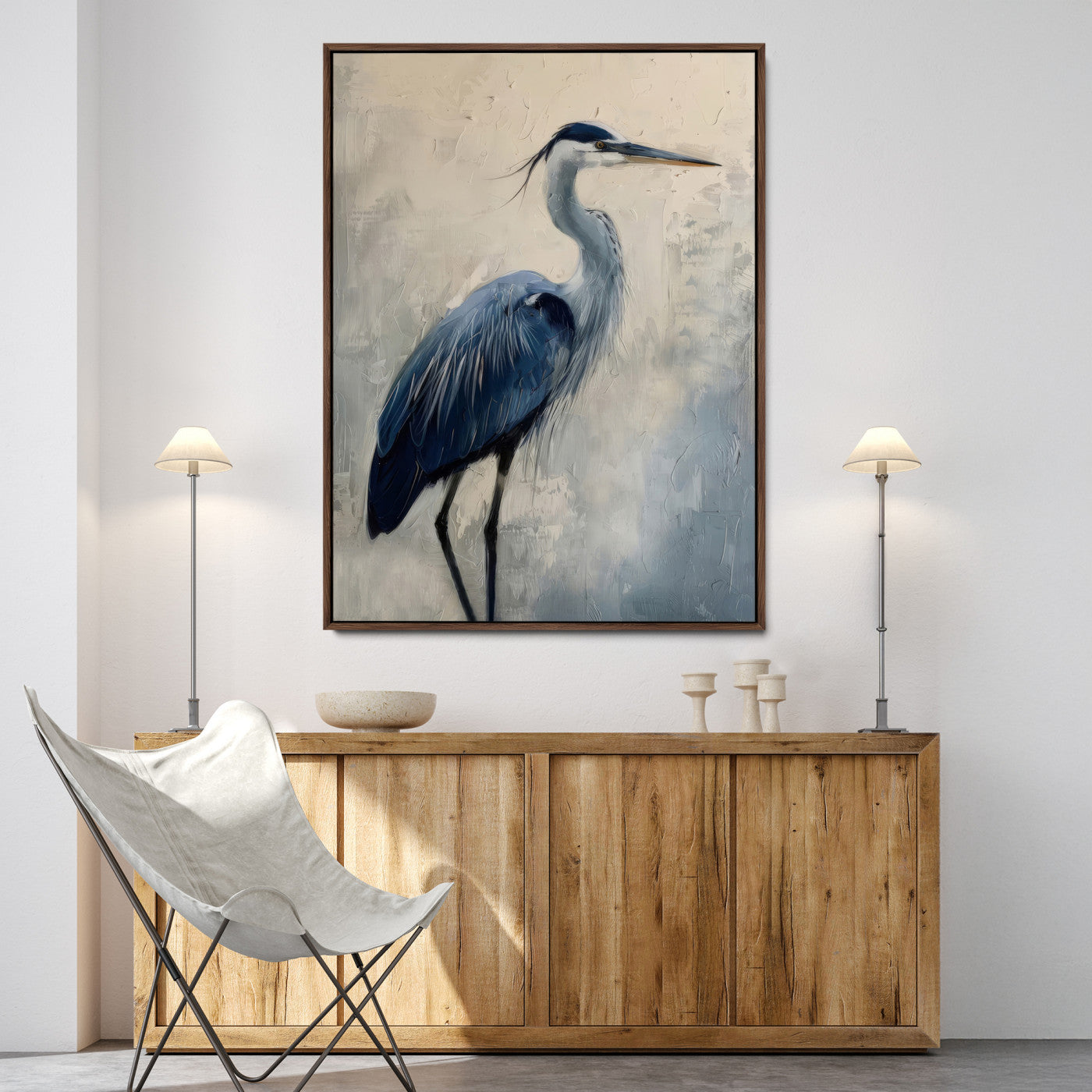 Blue heron standing gracefully on one leg, painted in soft neutrals and cool tones, perfect for modern coastal or nature-inspired decor.