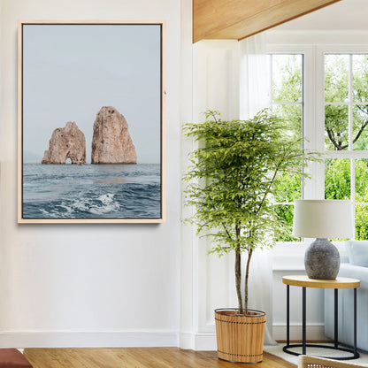 Serene photograph of the Faraglioni rocks in Capri with calm blue waters, perfect for Mediterranean coastal or minimalist travel-themed decor.
