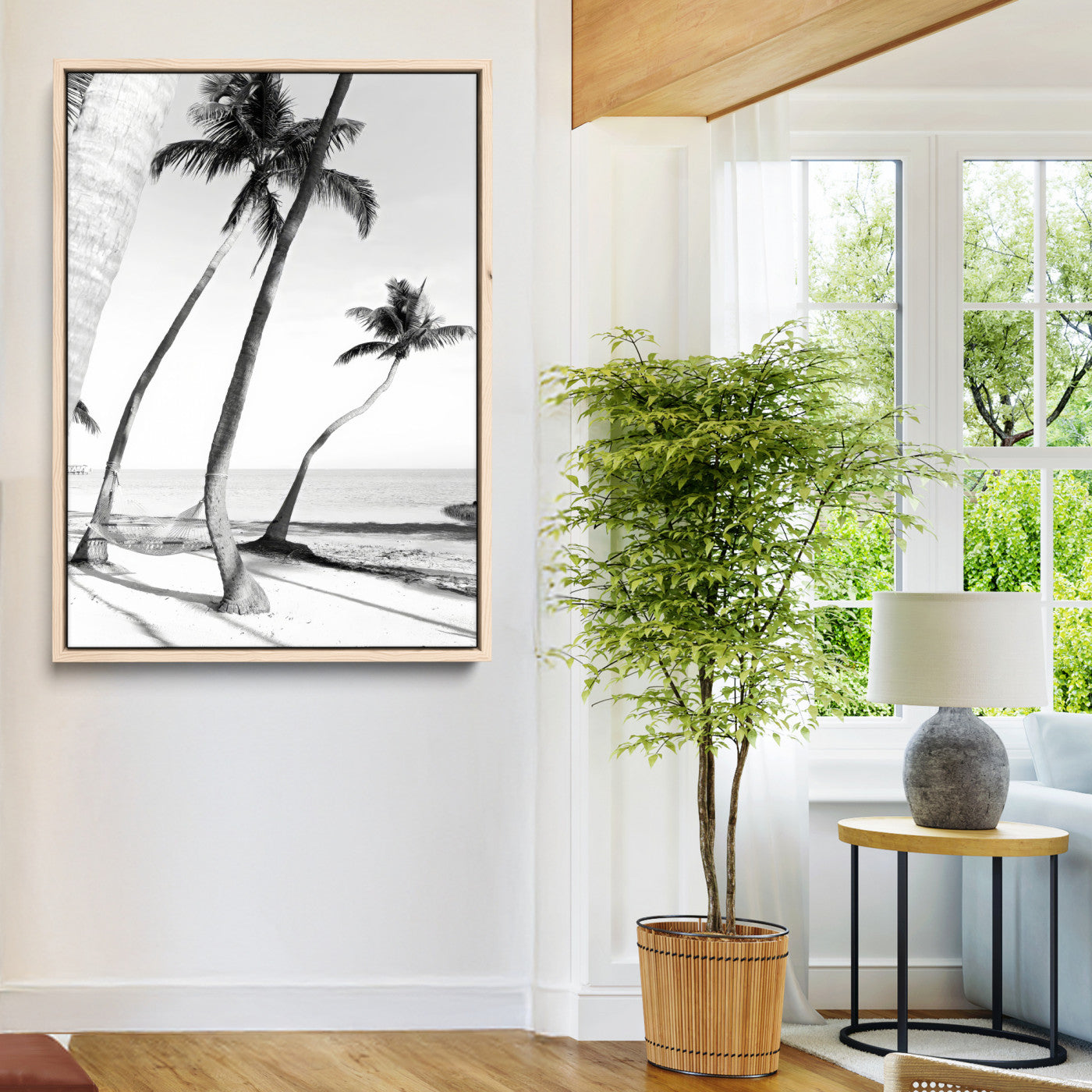 Black and white wall art of palm trees and a hammock on a beach, ideal for coastal minimalist or tropical-themed decor.