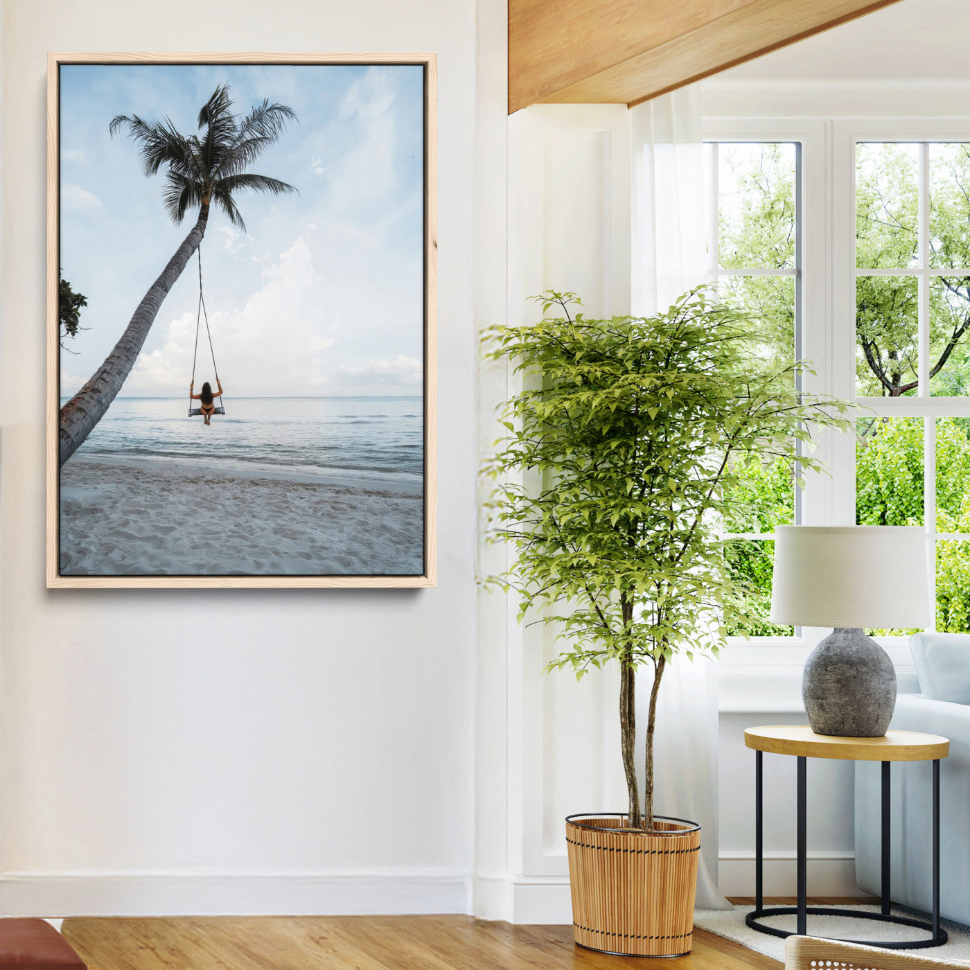 Wall art of a girl on a swing hanging from a palm tree over calm ocean waters, perfect for tropical or minimalist coastal decor.