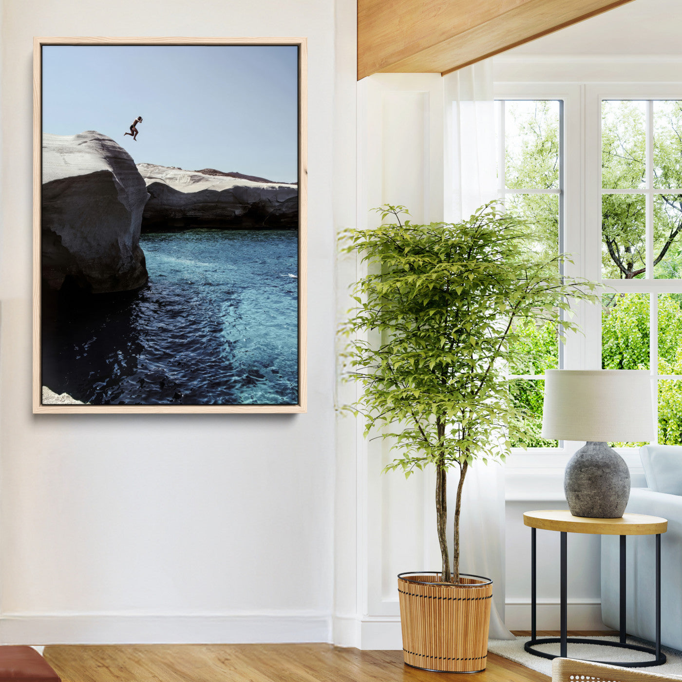 Canvas of a cliff diver above turquoise waters and rocky coastline under clear sky, ideal for adventurous minimalist or coastal home decor.