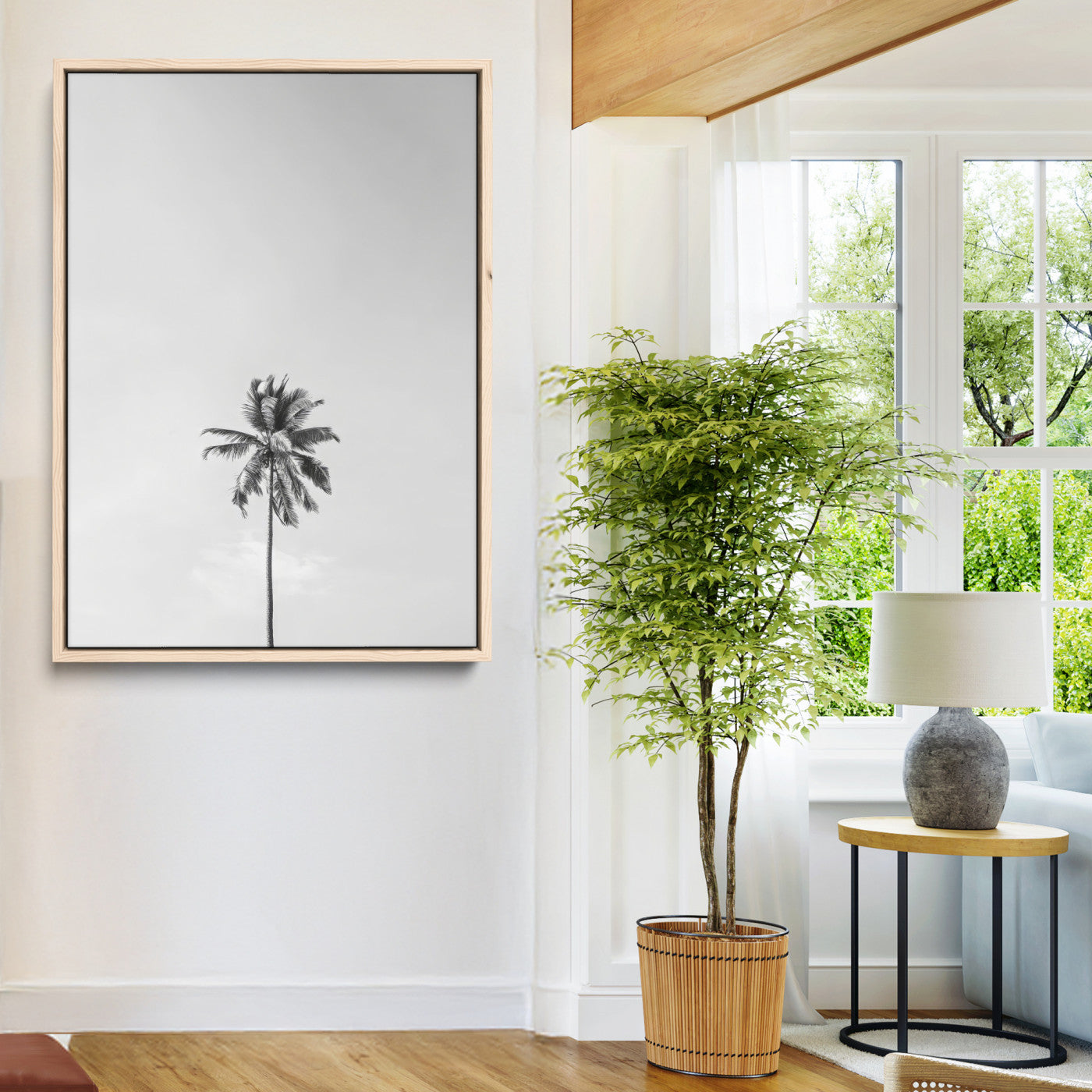 Canvas of a single palm tree in black and white with minimalist sky, ideal for modern coastal minimalist or tropical-inspired home decor.