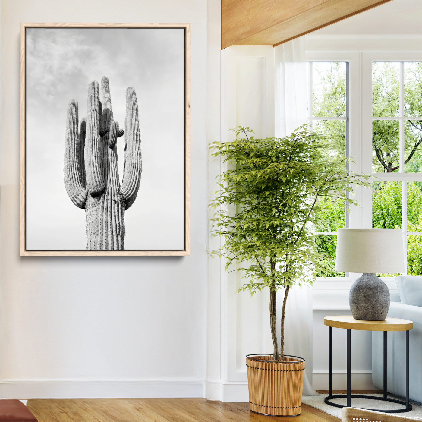 Canvas of a tall saguaro cactus in black and white with moody tones, perfect for southwestern minimalist or modern desert-themed home decor.