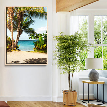 Tropical beach with palm trees, blue ocean, and clear sky, perfect for coastal or beach-themed wall decor in sunny living spaces.