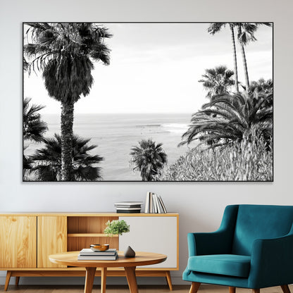 Monochrome canvas of palm trees framing a coastal surf scene, perfect for California-inspired or retro black-and-white beach decor.