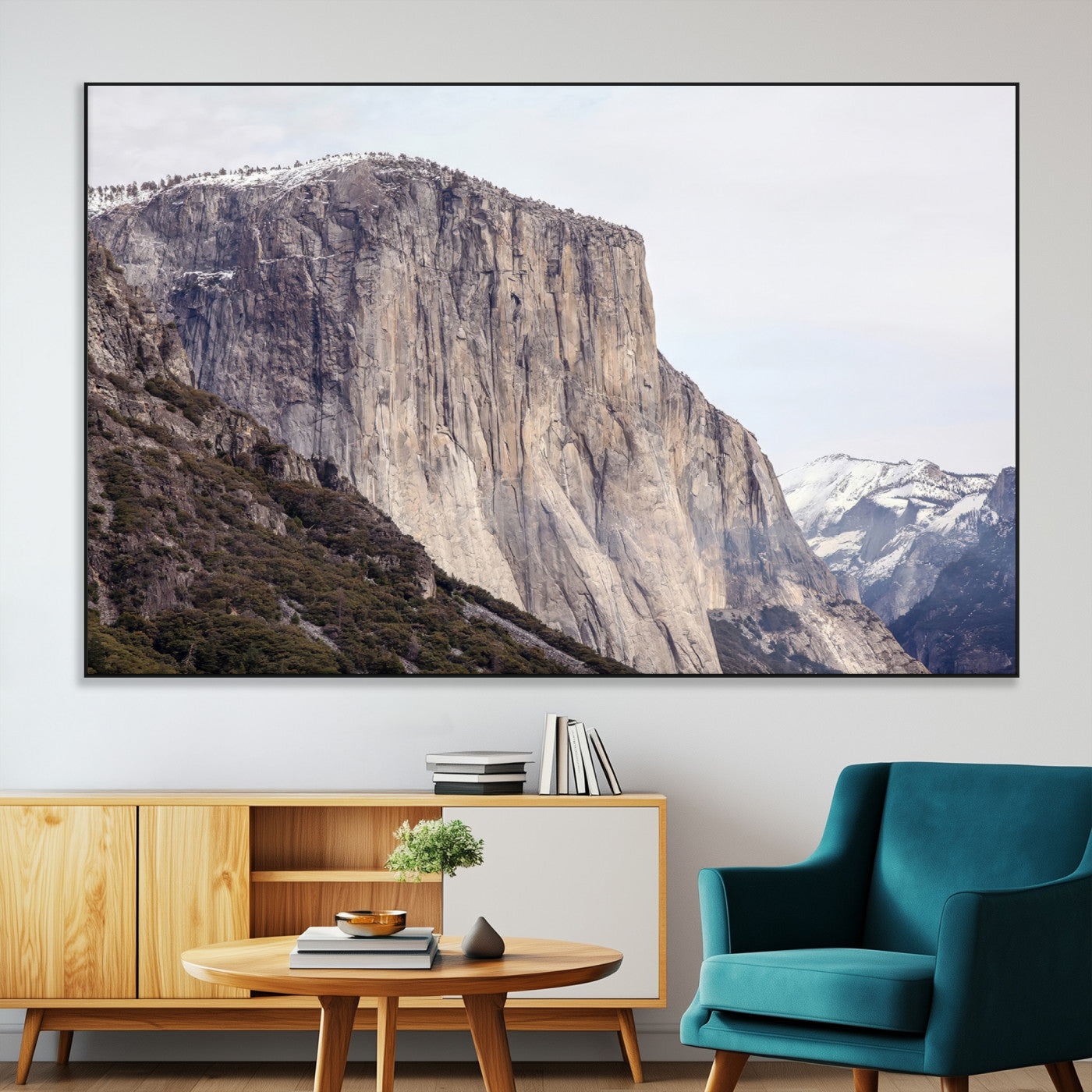 Framed canvas of El Capitan’s vertical granite face in Yosemite with snowy peaks, ideal for Sierra minimalism or mountain-inspired decor.
