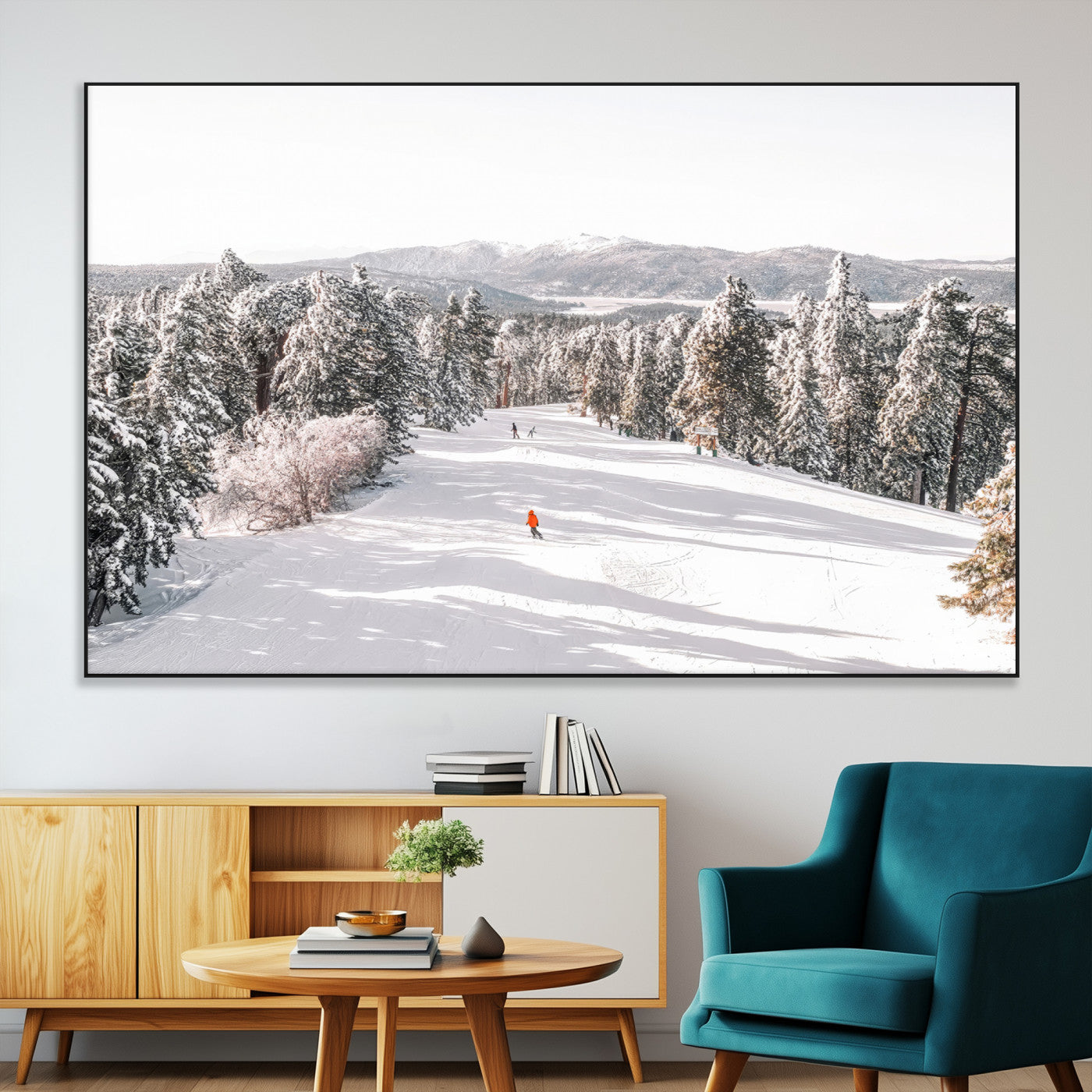 Bright ski trail lined with snow-covered pines and a skier in orange, perfect for alpine adventure or winter sports-inspired decor.