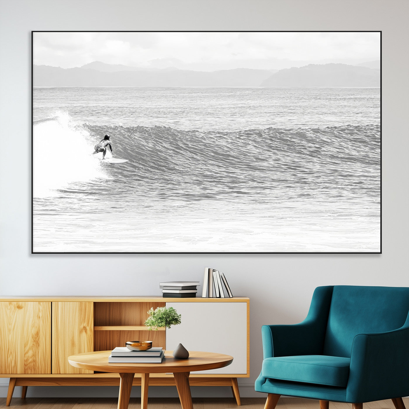 Monochrome photo of a surfer riding a wave with distant mountains, ideal for coastal motion or black and white surf-themed wall decor.