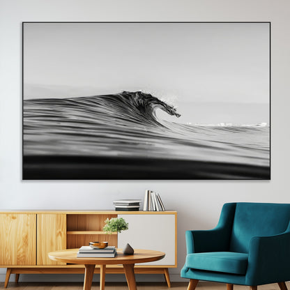 Striking black and white photo of a curling wave, ideal for modern coastal or minimalist wall decor settings.