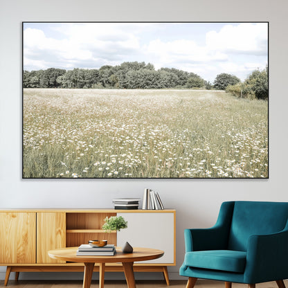 Soft-toned image of a wild daisy field under a cloudy sky, ideal for neutral or Scandinavian-inspired home decor.