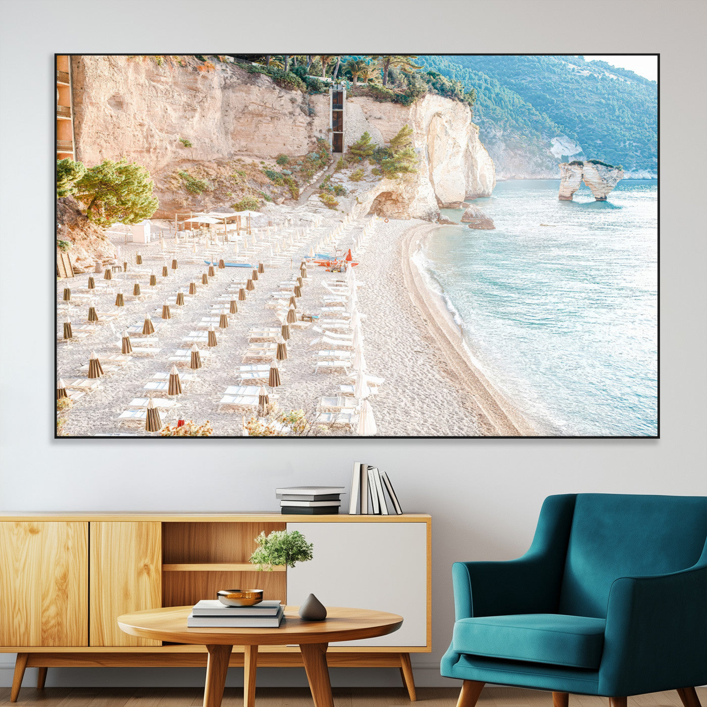 Wall art of a calm Mediterranean beach with rows of sun loungers and umbrellas in soft pastel tones, perfect for light coastal or vacation-themed decor.