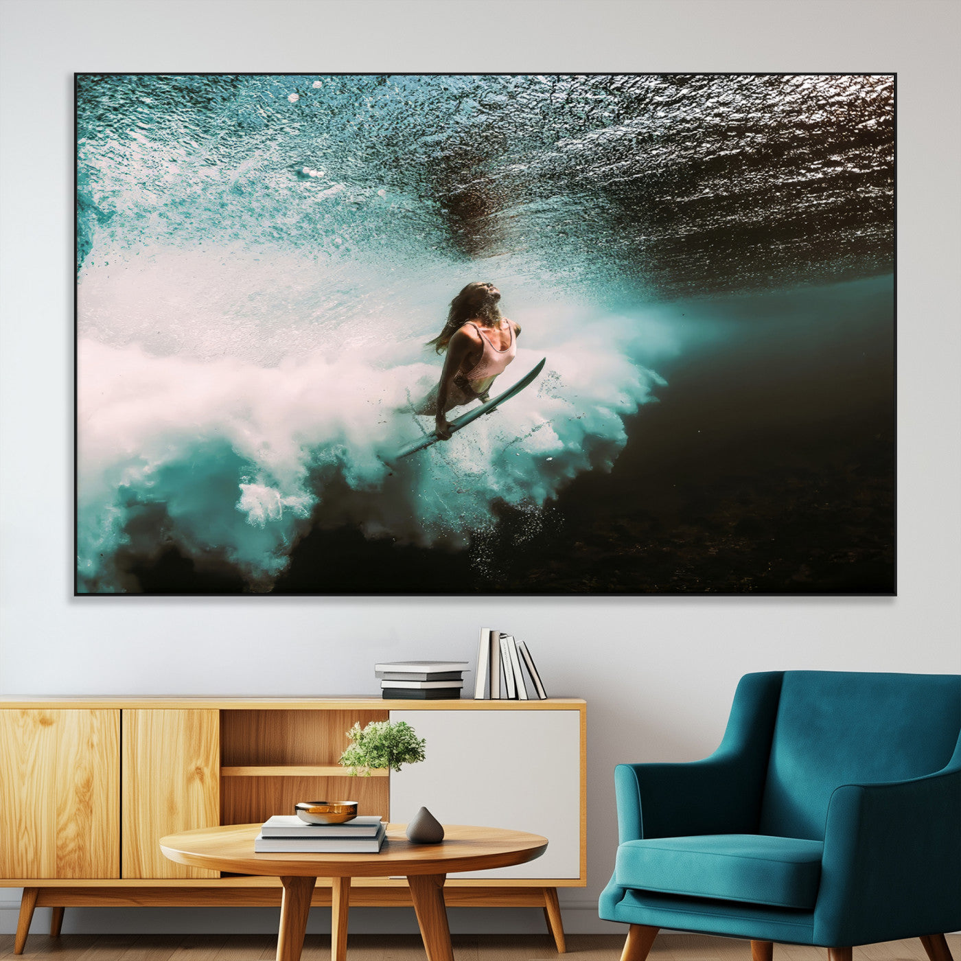 Vibrant underwater photo of a female surfer diving through turquoise waves, perfect for coastal boho or surf-inspired home decor.