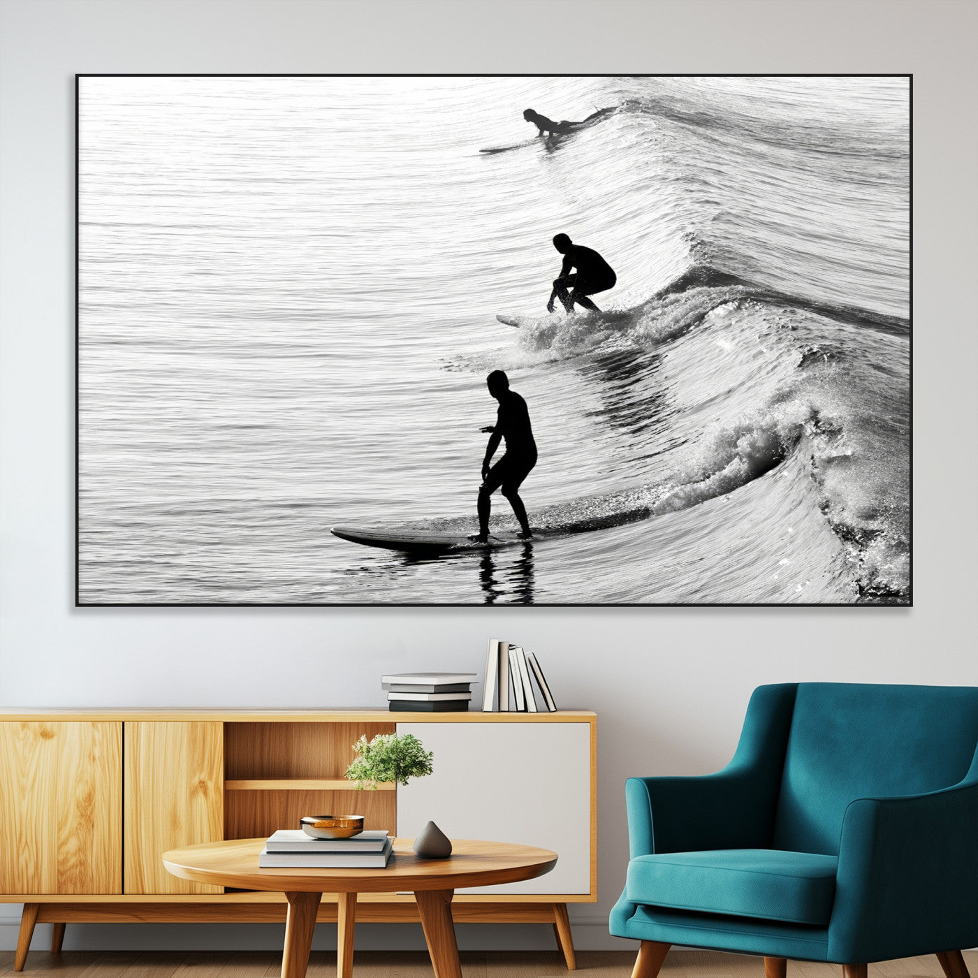 Black and white photo of surfers riding waves in a moody, high-contrast scene, ideal for modern coastal or surf-inspired home decor.
