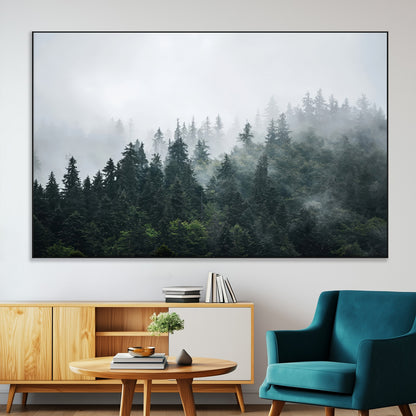 A misty evergreen forest shrouded in soft fog, creating a tranquil and moody landscape with lush green trees fading into the distance.
