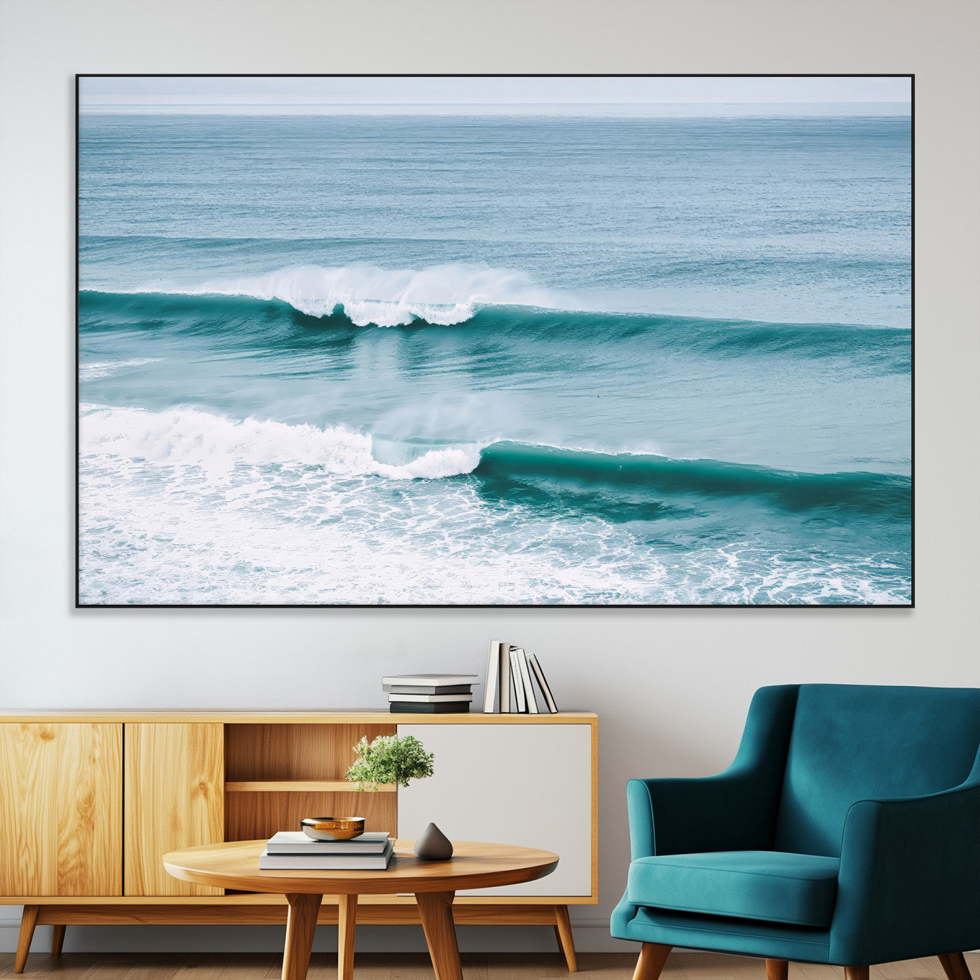 Powerful ocean waves rolling towards the shore, their turquoise hues blending with white sea foam under an open horizon, capturing the essence of the ocean's movement.