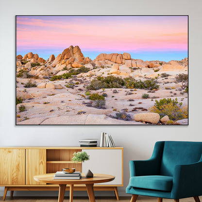 A breathtaking desert landscape featuring rugged rock formations under a vibrant pastel sunset sky, capturing the warmth and serenity of a Southwestern wilderness.