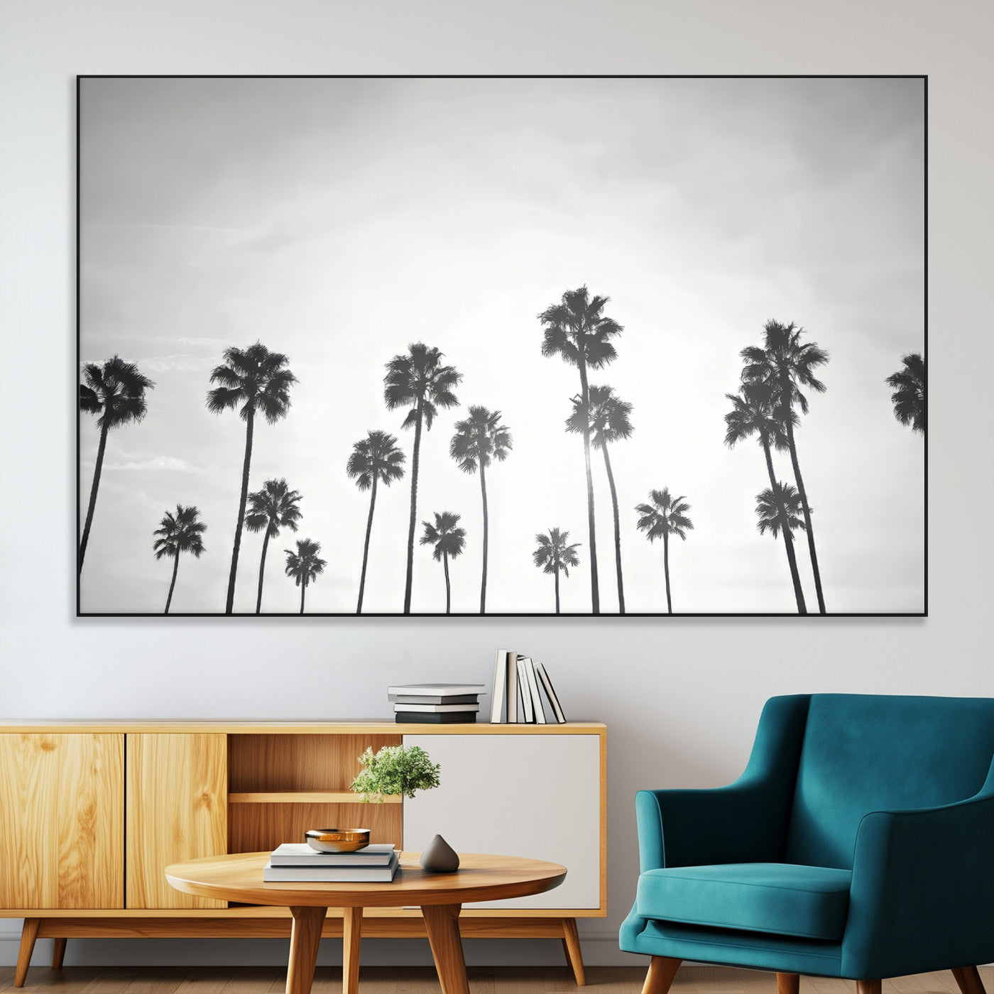 A black and white minimalist scene featuring tall palm trees silhouetted against a bright sky, creating a dreamy and timeless tropical aesthetic.