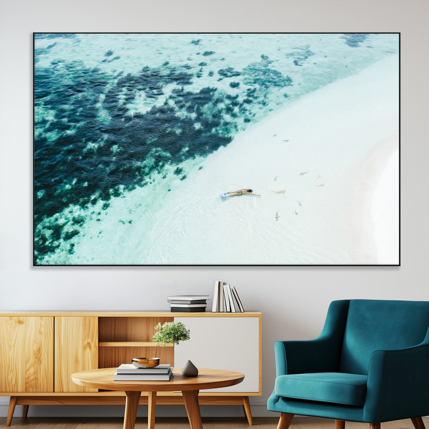 Canvas featuring an aerial view of a swimmer in shallow turquoise waters with coral patterns, ideal for tropical coastal home decor.