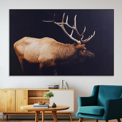 Side view of a majestic elk with large antlers against dark background, perfect for rustic lodge or cabin style home decoration.
