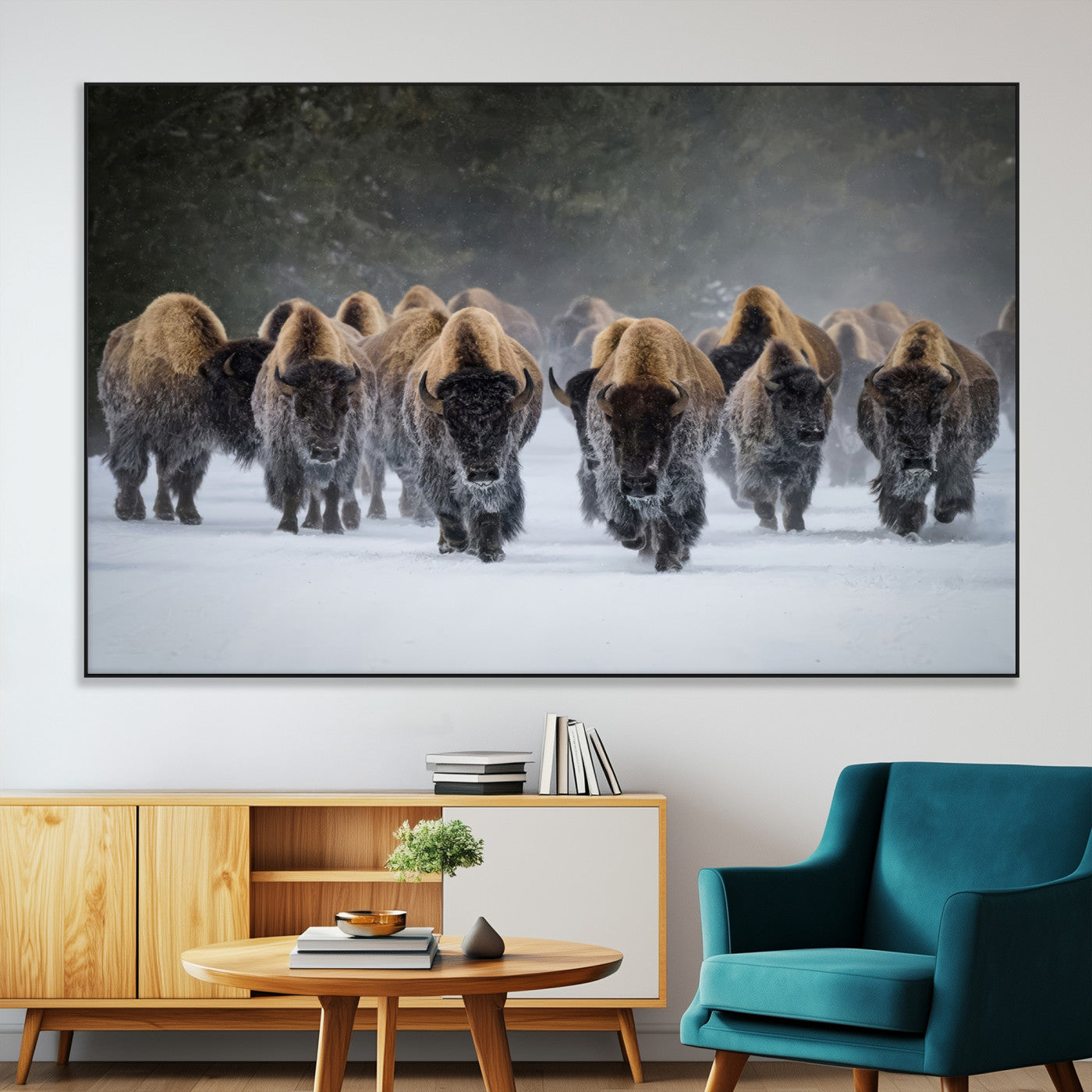 A herd of American bisons walking through deep snow in a forest, evoking a powerful rustic wilderness mood for western-style interiors.