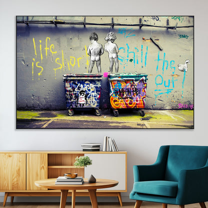 Graffiti-style canvas art with bold text and two naked figures over urban dumpsters, ideal for edgy or street-style decor.