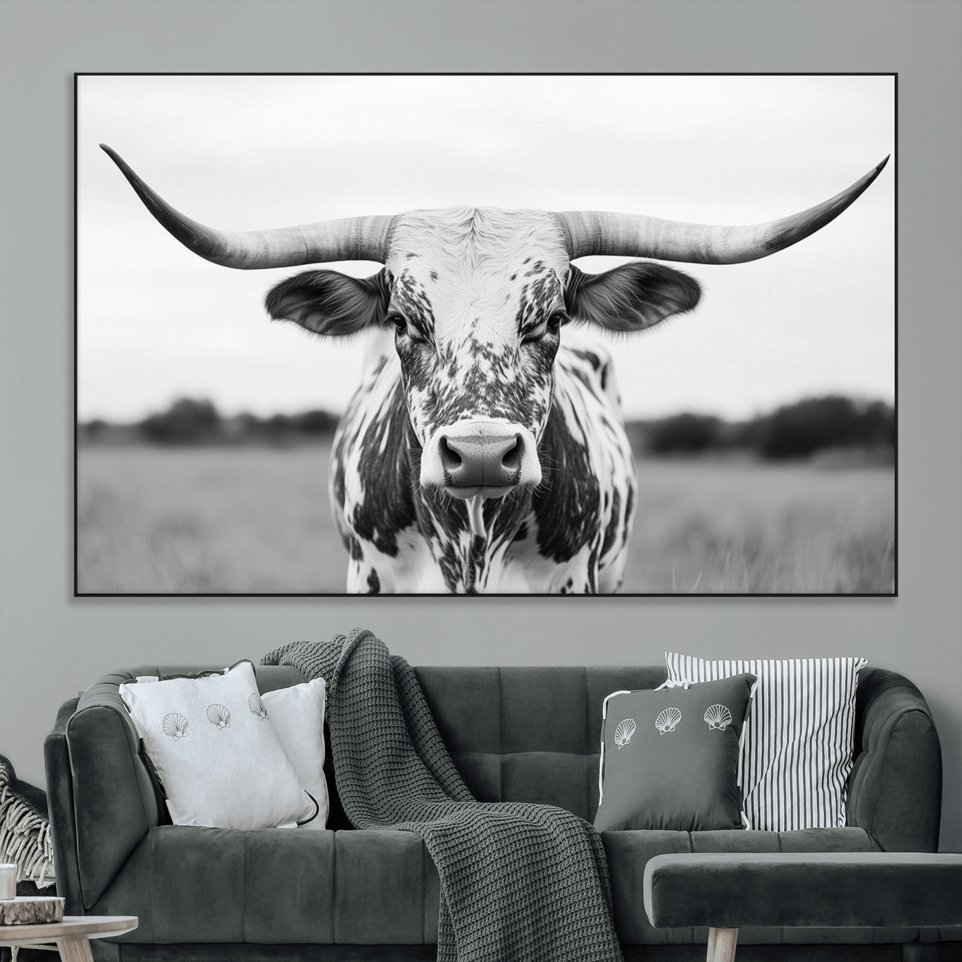 Capture the strength and elegance of nature with this striking black and white portrait of a longhorn cow. Its powerful presence makes a bold statement in any room.