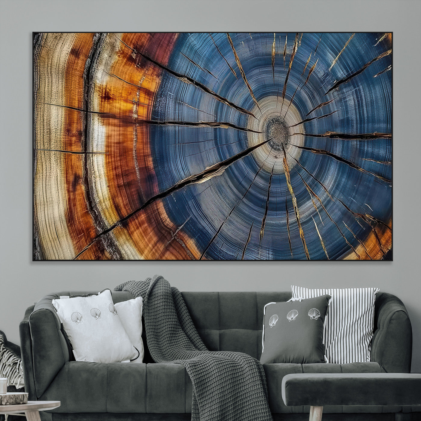 A stunning close-up view of a tree trunk, showcasing the intricate growth rings in a vibrant mix of warm browns, cool blues, and hints of natural texture.