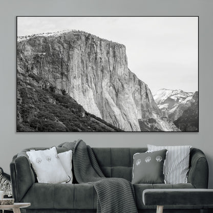 Monochrome canvas of El Capitan’s granite wall in Yosemite with snowy peaks, ideal for dramatic mountain or black-and-white nature decor.