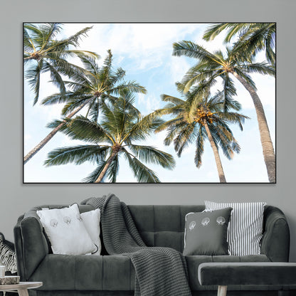 Framed canvas of tall palm trees reaching into a tropical sky, ideal for beach home or relaxed island-inspired wall decor.