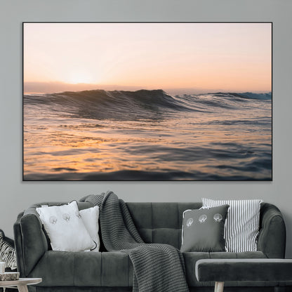 Framed canvas of ocean waves glowing in sunset light, ideal for golden hour calm or peaceful coastal-inspired wall decor.