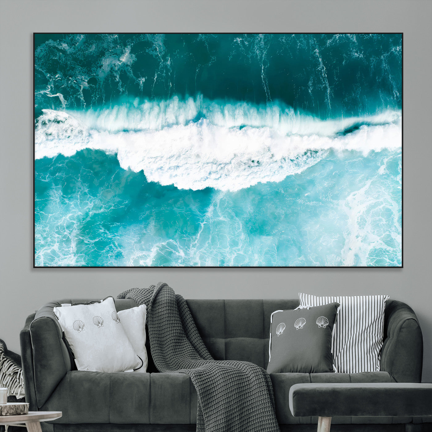 Aerial view of turquoise ocean waves crashing with white foam, perfect for tropical coastal or modern beach-style home decor.