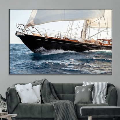 Close-up of a classic sailing yacht with wooden deck and full sails, perfect for nautical or coastal-style decor in ocean-themed spaces.