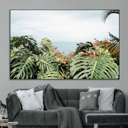 Monstera leaves and tropical flowers framing a calm ocean view, ideal for tropical coastal or exotic jungle-style interior wall decor.